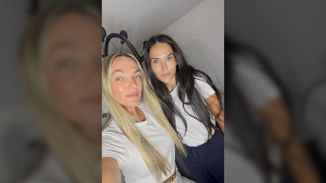 Photo of Demi Moore posed with her facialist.