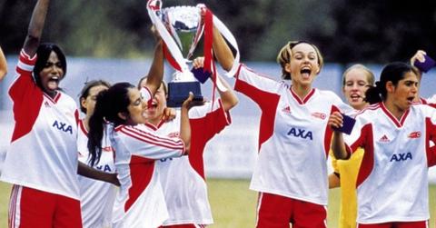 Parminder Nagra and Keira Knightley, in their soccer uniforms, shared a triumphant moment in Bend it Like Beckham.