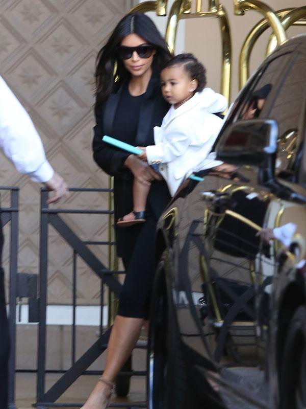 Watch Kim Kardashian Pick Up North As Photographer Asks About Her Nude ...