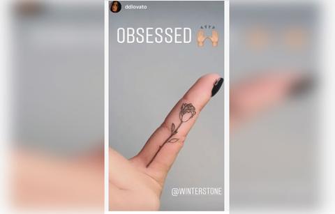 Demi Lovato rose tattoo