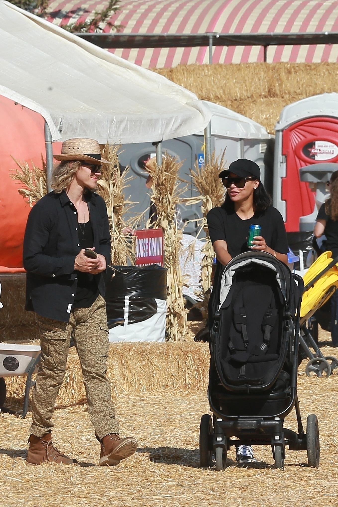 Naya Rivera and Ryan Dorsey take their son to Underwood family Farms to pick out a pumpkin