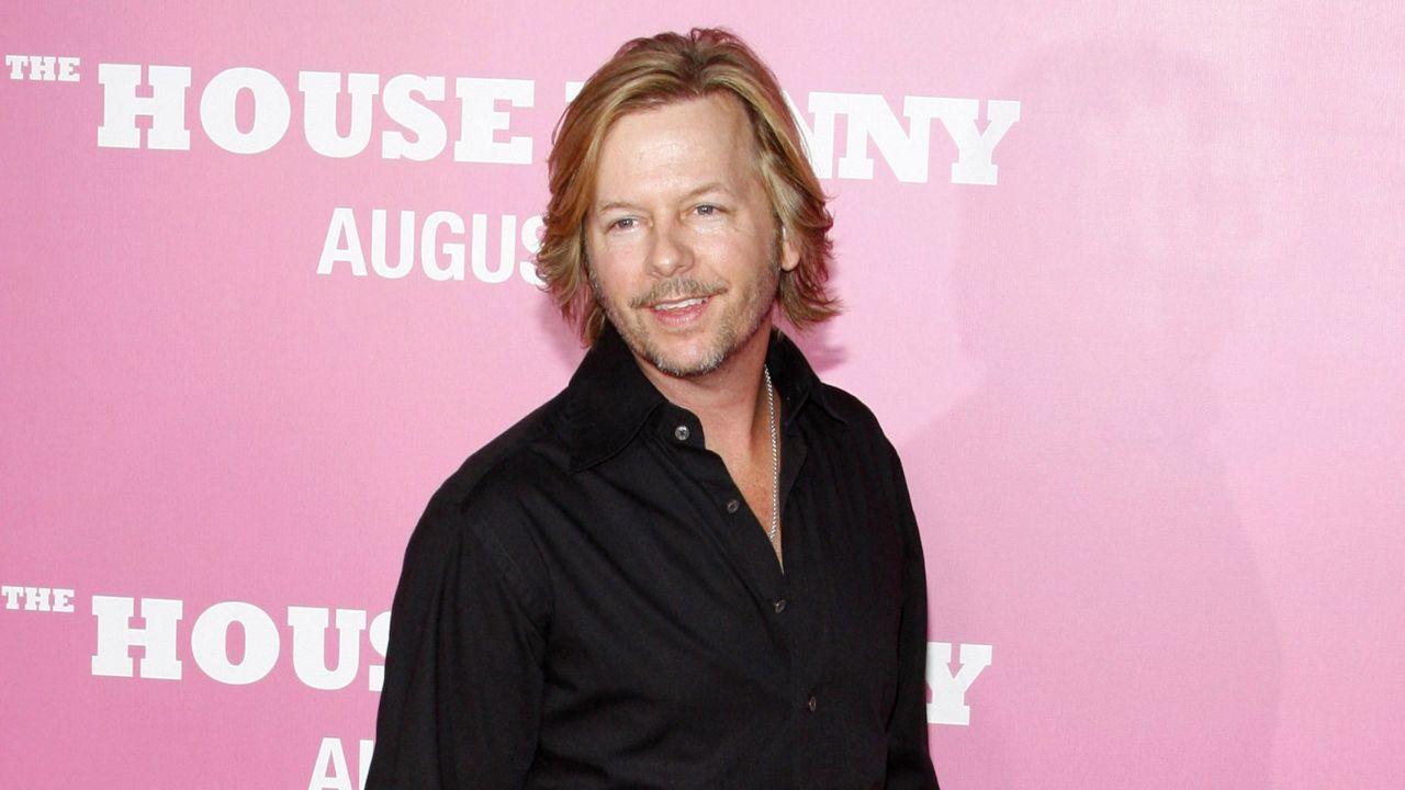 Image of David Spade recalled sharing the 'Saturday Night Live' stage with Adam Sandler during their early comedy careers.