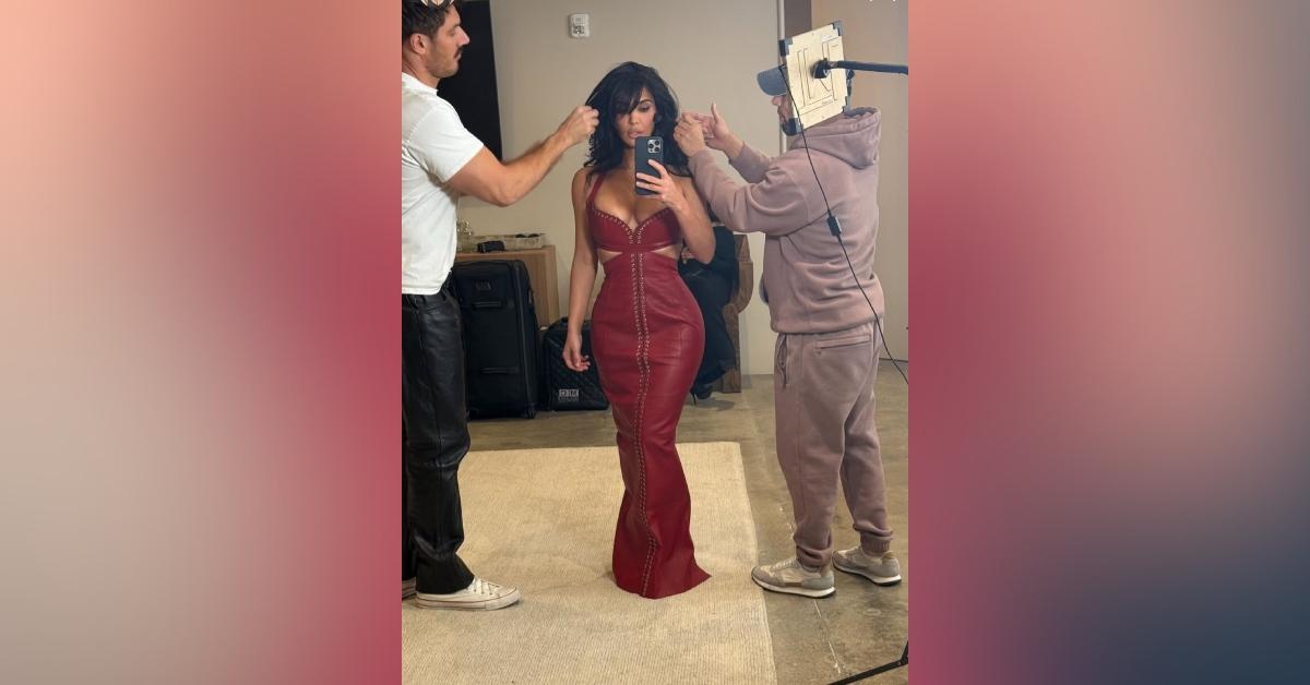 kim kardashian nearly spills out red gown photos