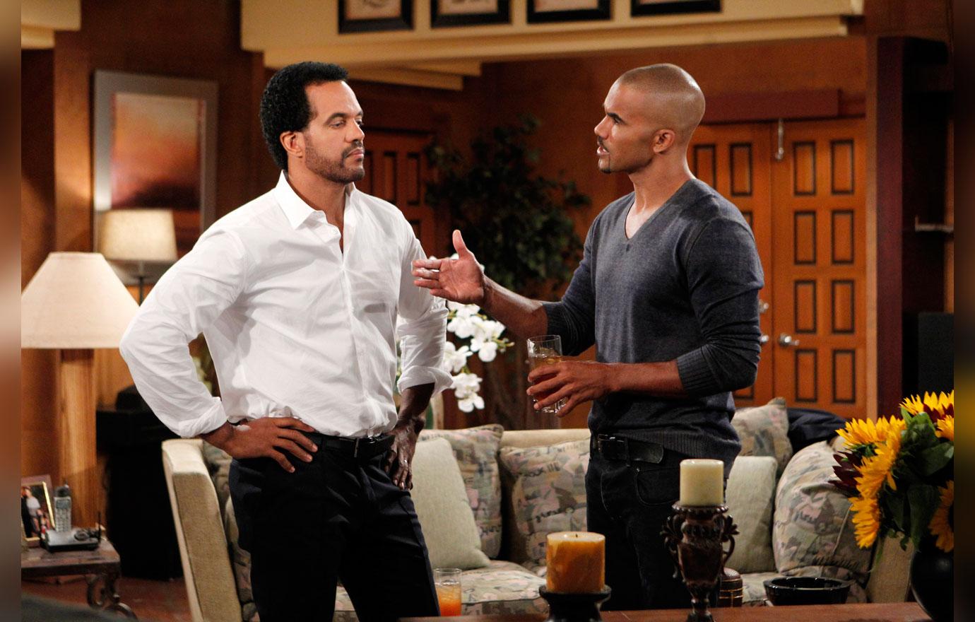 Y&R Neil and Malcolm about to handshake scene.