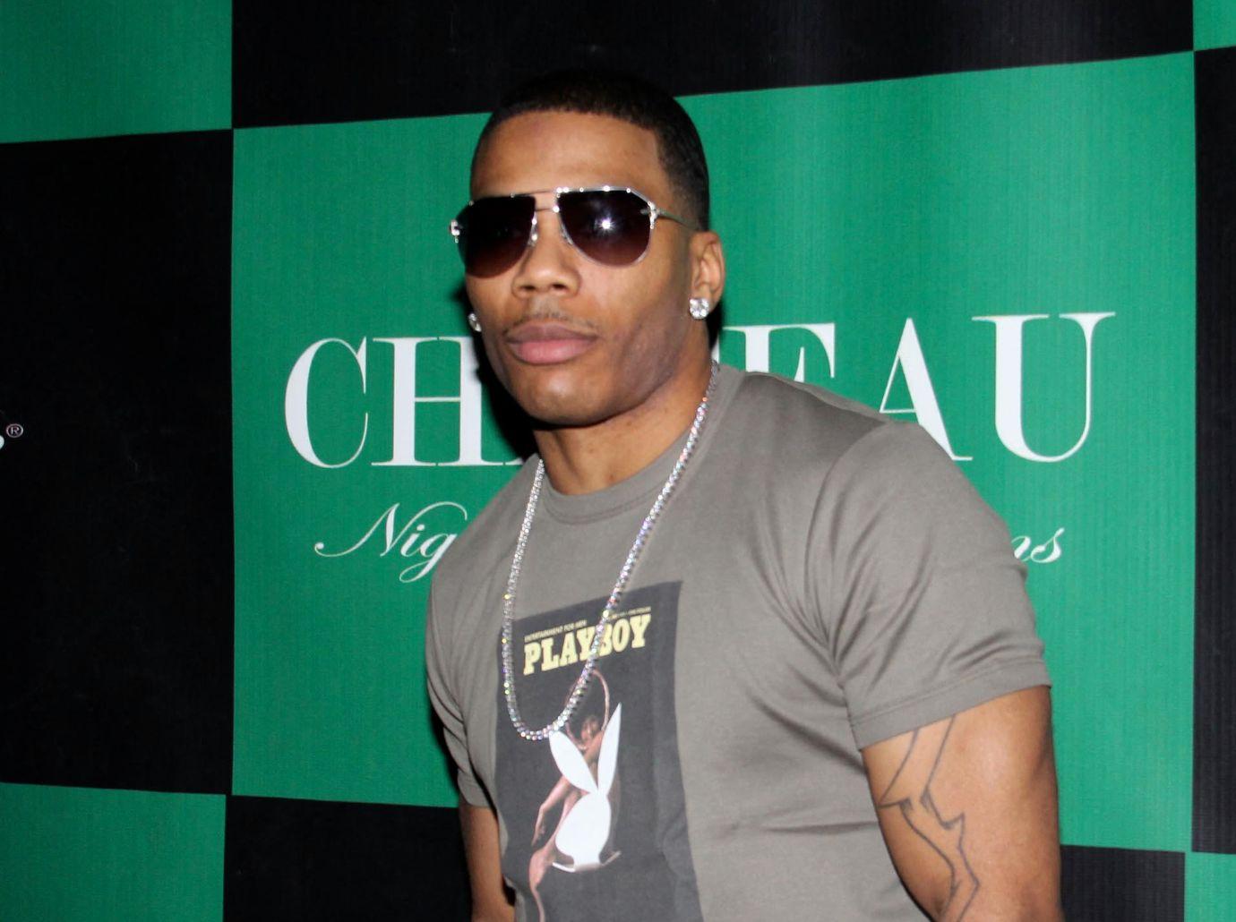 ashanti debuts baby bump engaged nelly photos