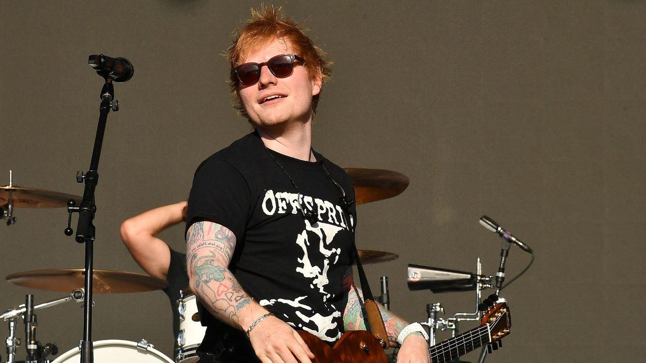 Image of outside Ed Sheeran's Philadelphia concert, protestors held signs reading 'Free Palestine' and 'Stop Genocide.'