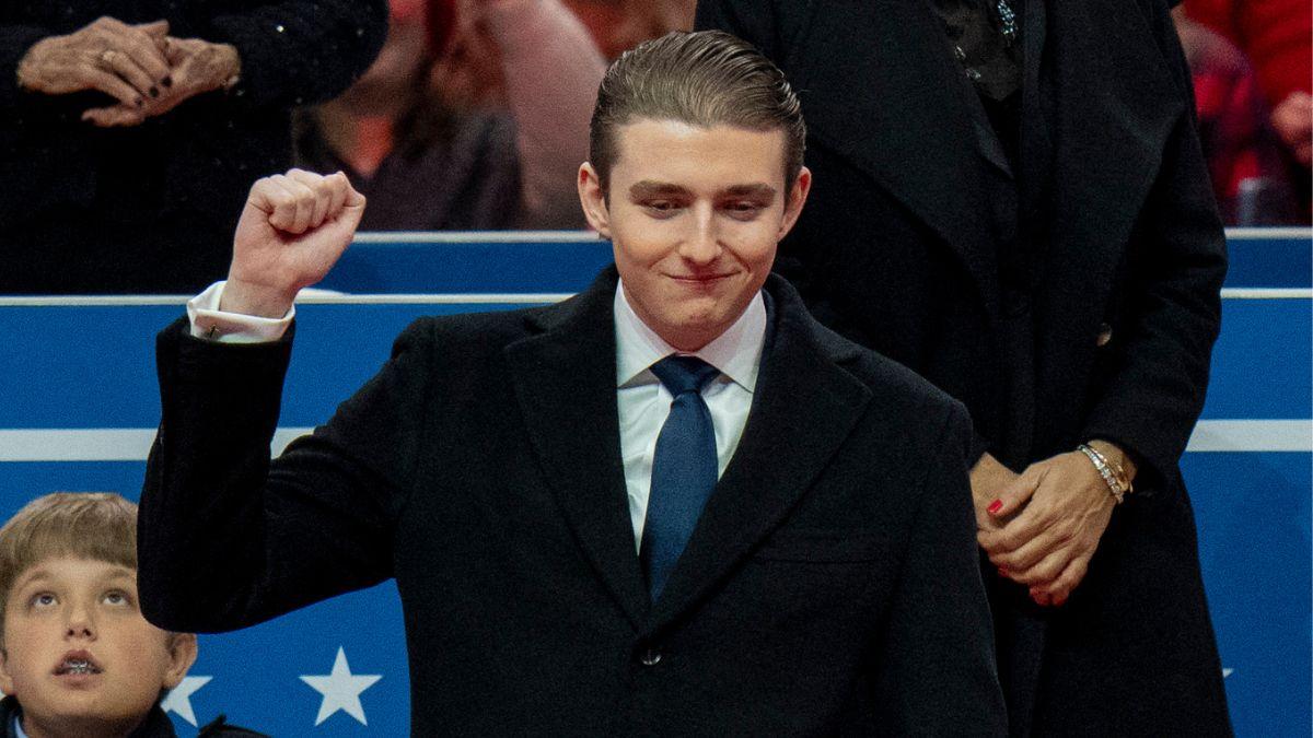 image of Barron Trump alerted police that the woman was 'getting beat up.'