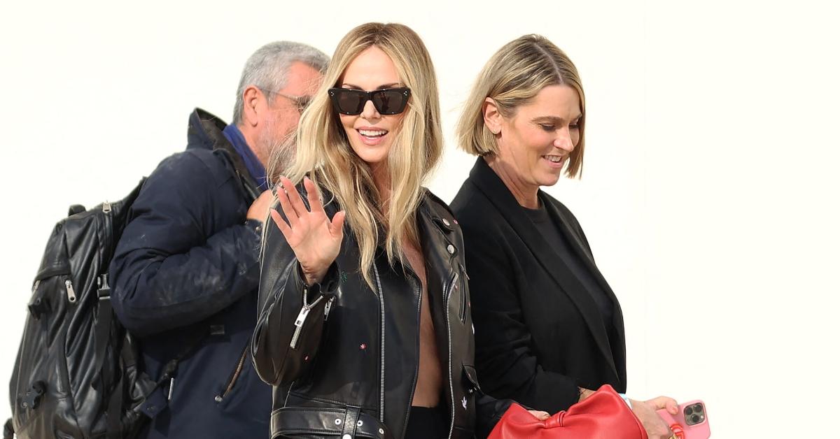 Photo of Charlize Theron didn't greet Johnny Depp at a Dior Paris Fashion Week show.