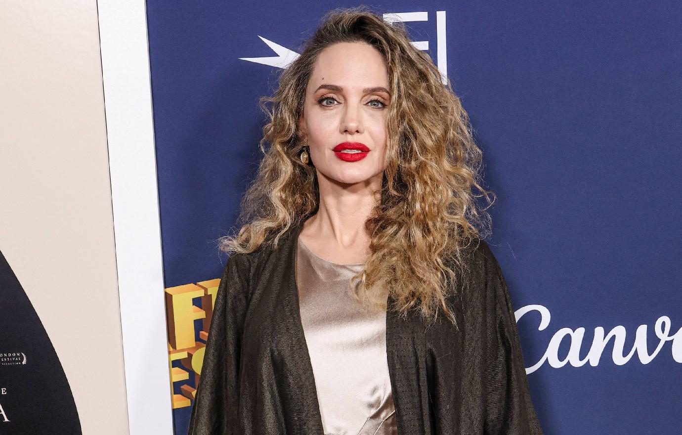 single angelina jolie curly hairstyle premiere maria brad pitt photos