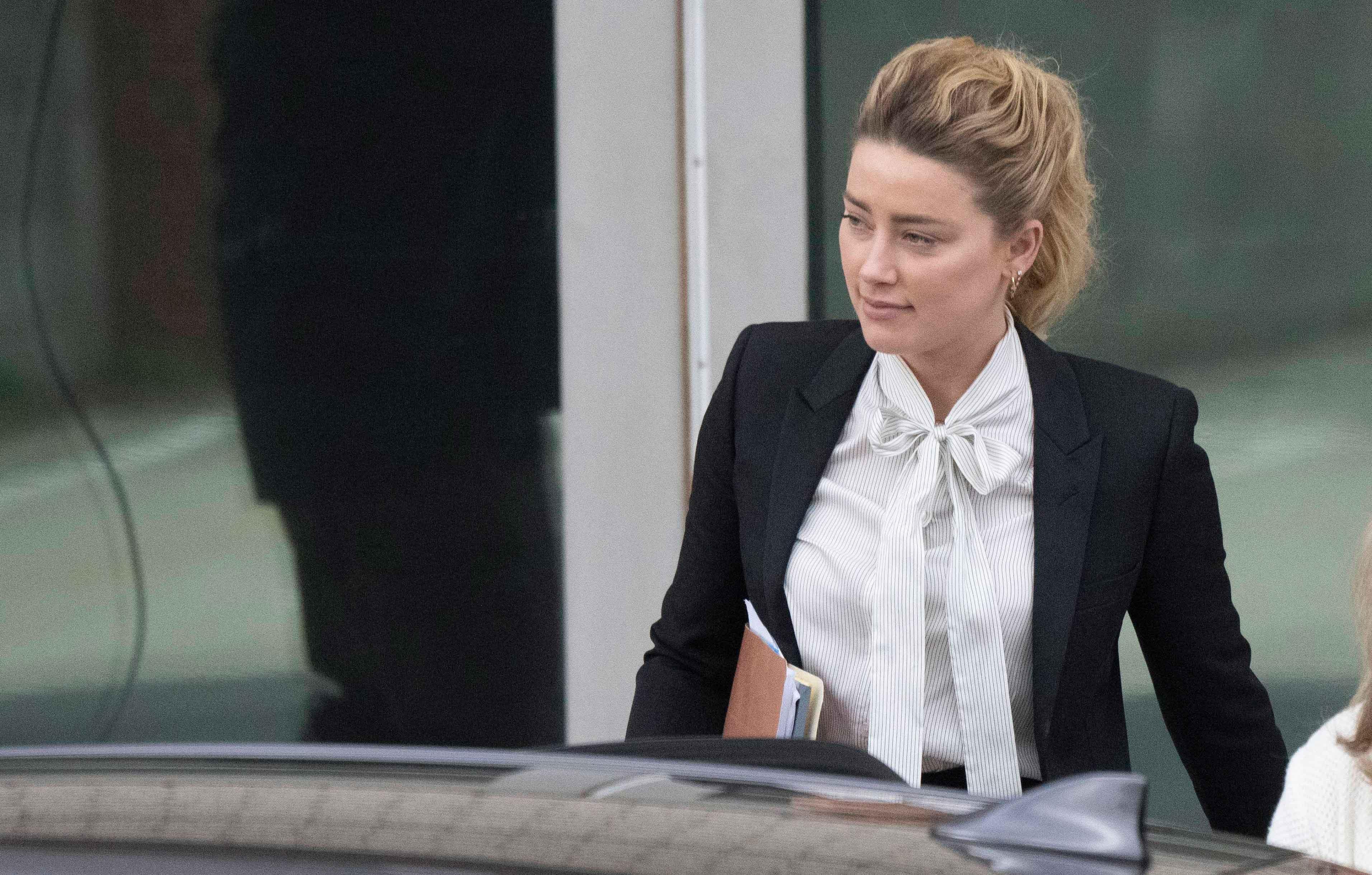 Jason Momoa 'likes' Amber Heard and Johnny Depp statements after jury rules  in Pirates star's favour