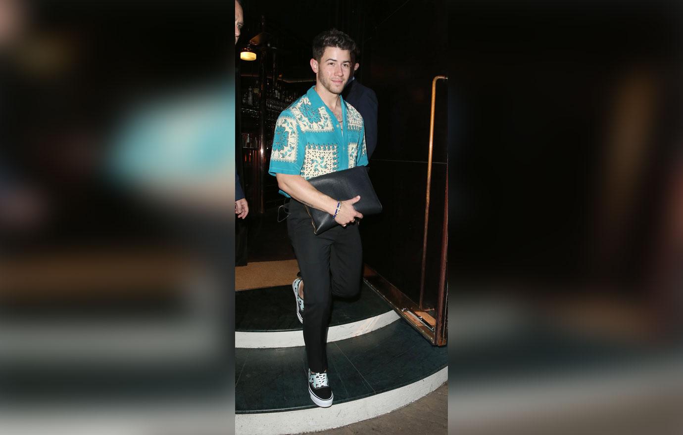 nick jonas leaving restaurant in london