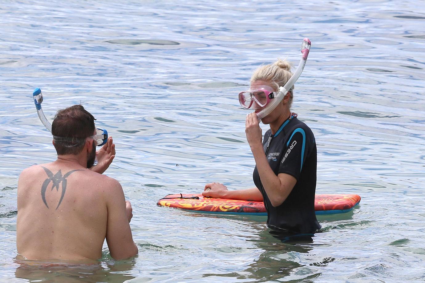 tarek el moussa and heather rae young hit the beach on vacation in maui