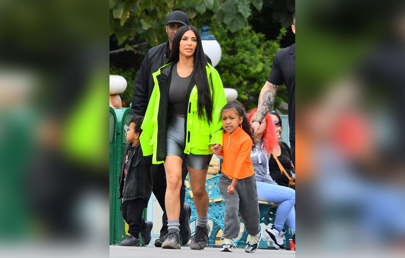 EXCLUSIVE: Kim &amp; Kourtney Kardashian enjoy a day at Disneyland with their kids in Anaheim, CA.