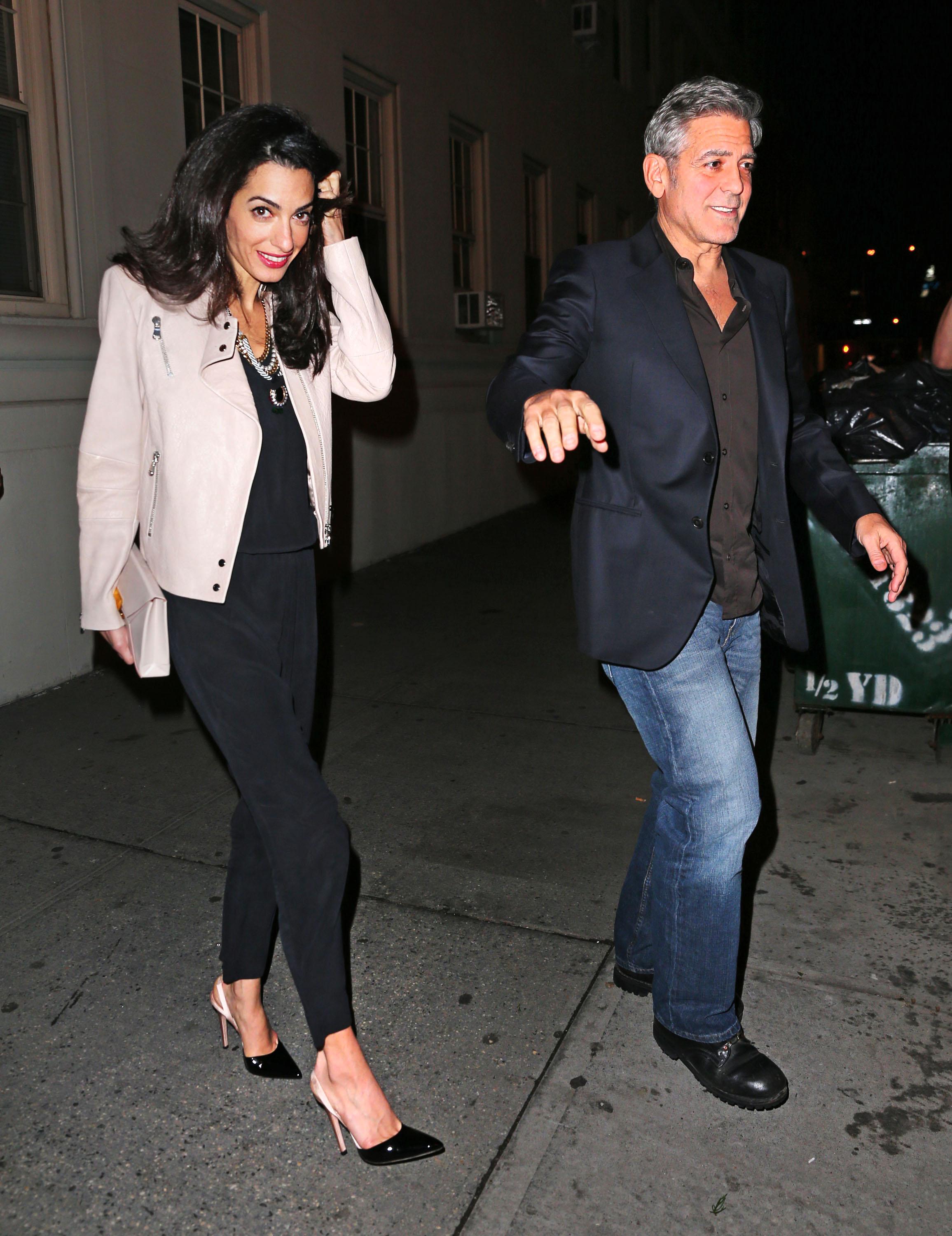 EXCLUSIVE: Amal Clooney and George Clooney have a 3 hour dinner with Julia Roberts (not pictured) at Claudette in New York City, NY