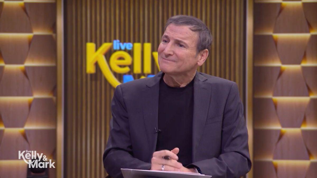 Image of Kelly Ripa was poking fun at Michael Gelman's stretching excercises.