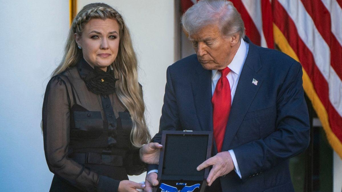 image of Erika Kirk was criticized for smiling alongside Mike Johnson. 