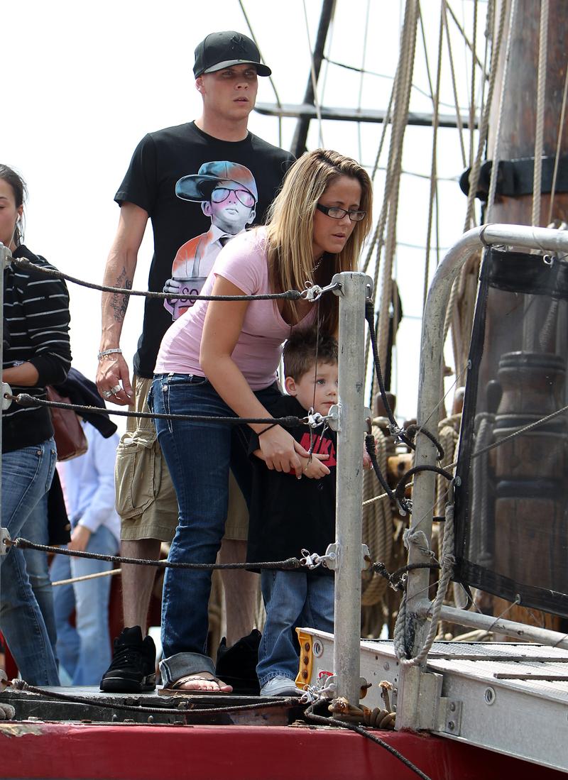 Jenelle Evans from Teen Mom with son Jace and fiance Gary Head checking out a Pirate ship and Battleship in Wilmington North Carolina.