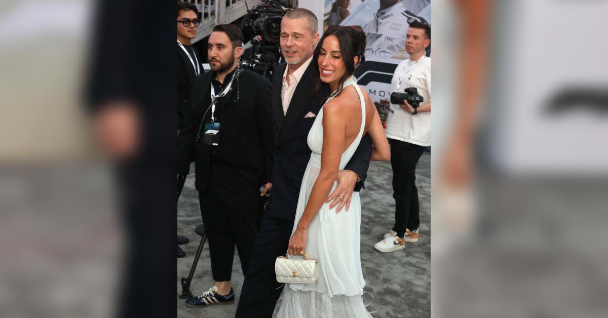 brad pitt ines de ramon hold hands red carpet f premiere nyc photos