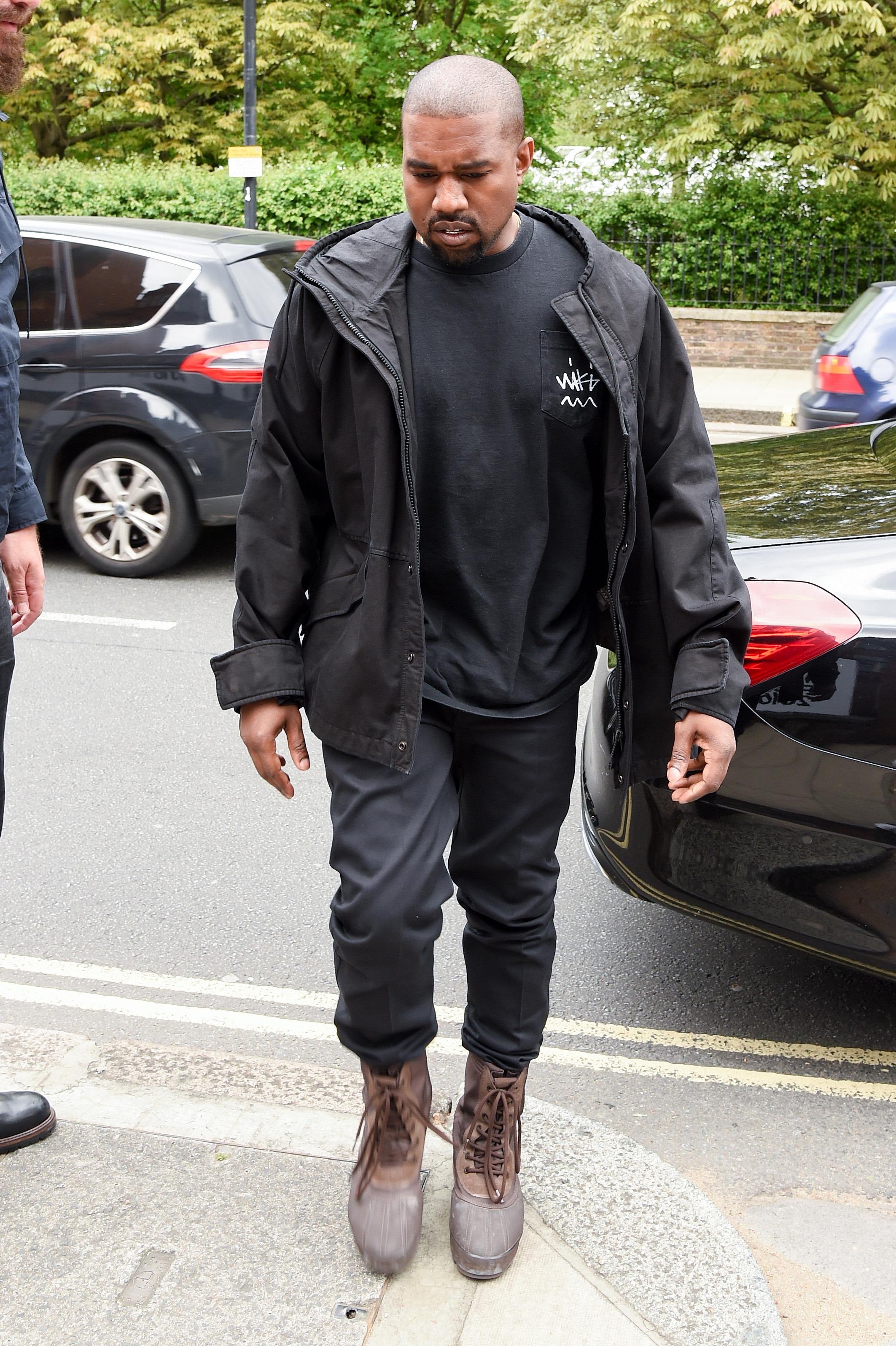 Kim and Kanye arrive at the Vogue Festival in London