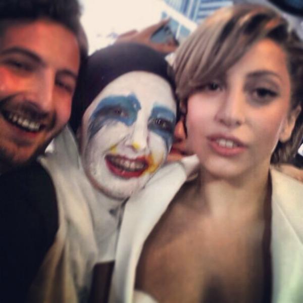 Mo and Fatima Kanaan pose with Lady Gaga in Times Square.