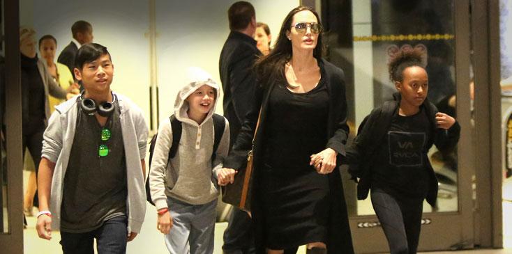 Angelina jolie kids lax tattoo HERO