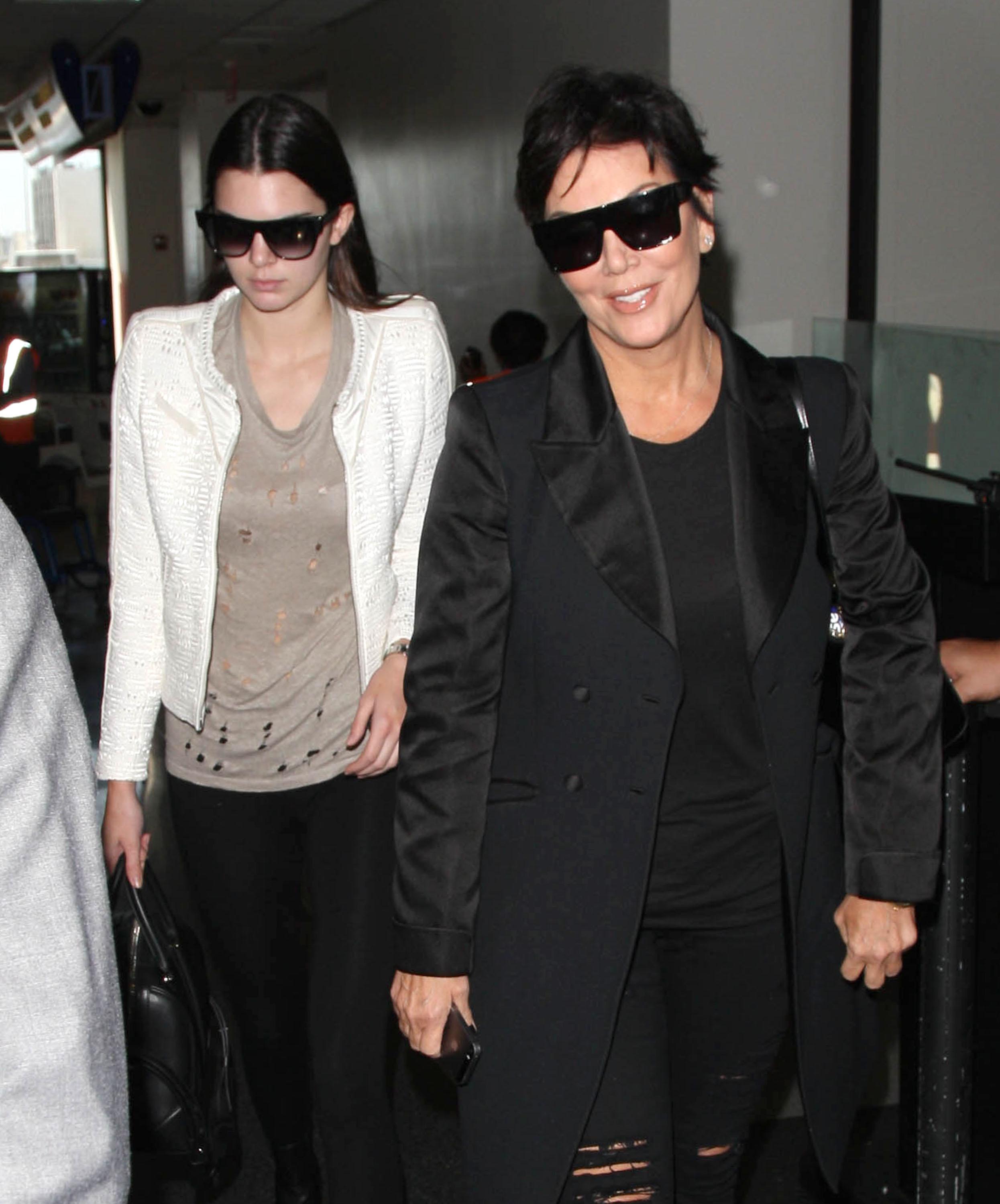 Kris &#038; Kendall Jenner Land At LAX Airport