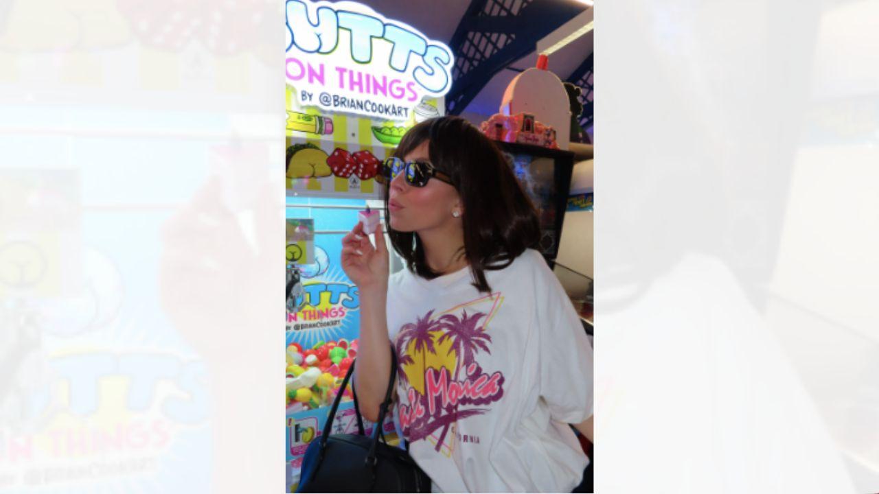 unrecognizable sydney sweeney brunette wig amusement park friend photos