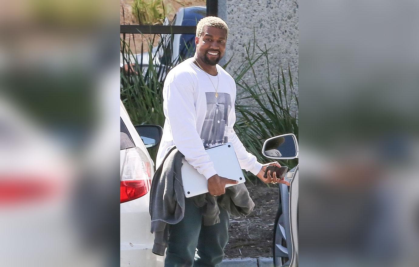 *EXCLUSIVE* Kanye West is all smiles as he arrives for work in Calabasas