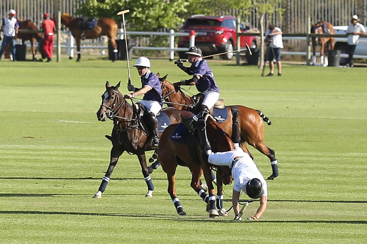 Prince Harry Falls from His Horse During  the Fundraising Polo Match in Aid of His Charity Sentebale.