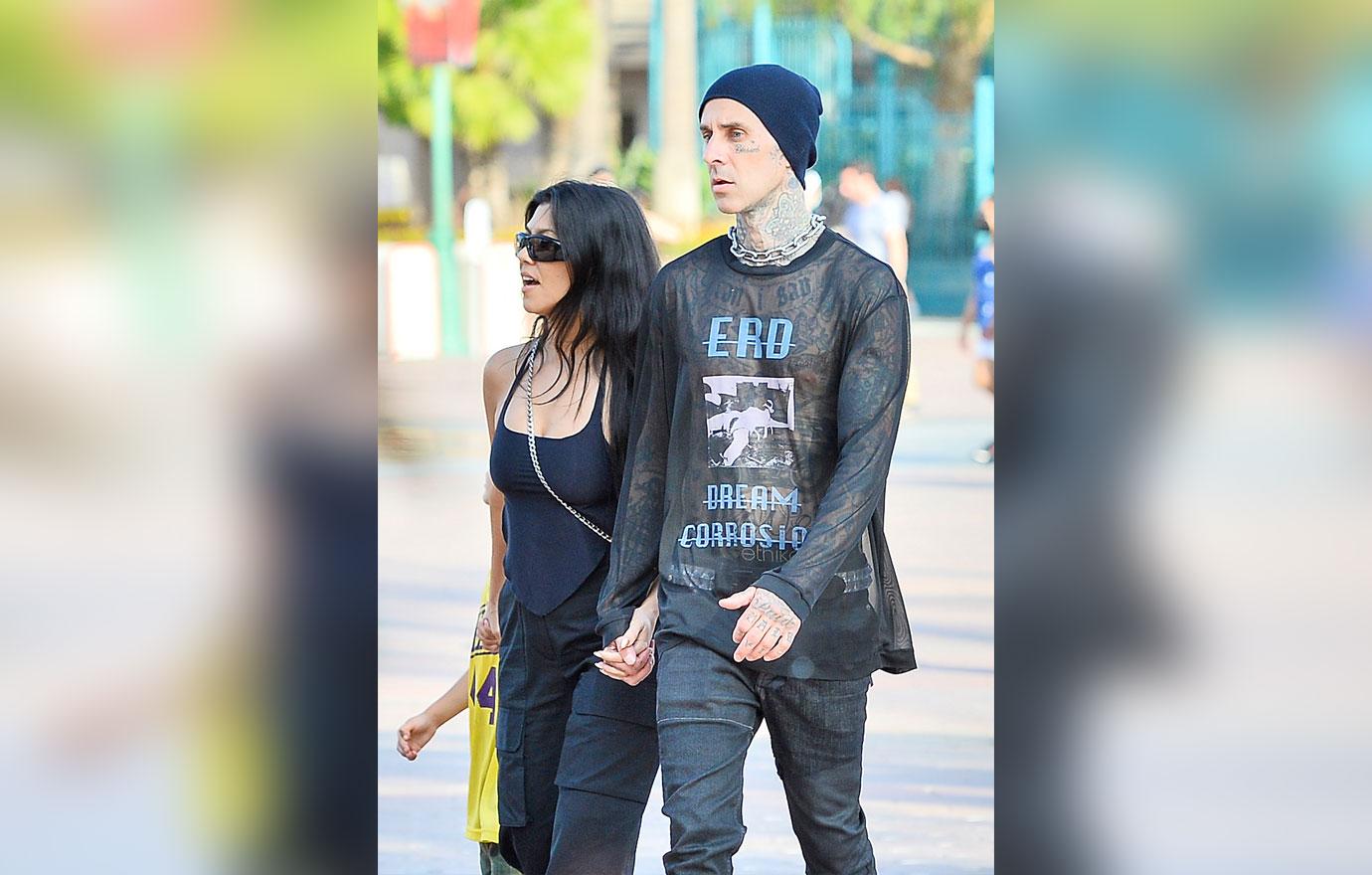 kourtney kardashian and travis barker at disneyland