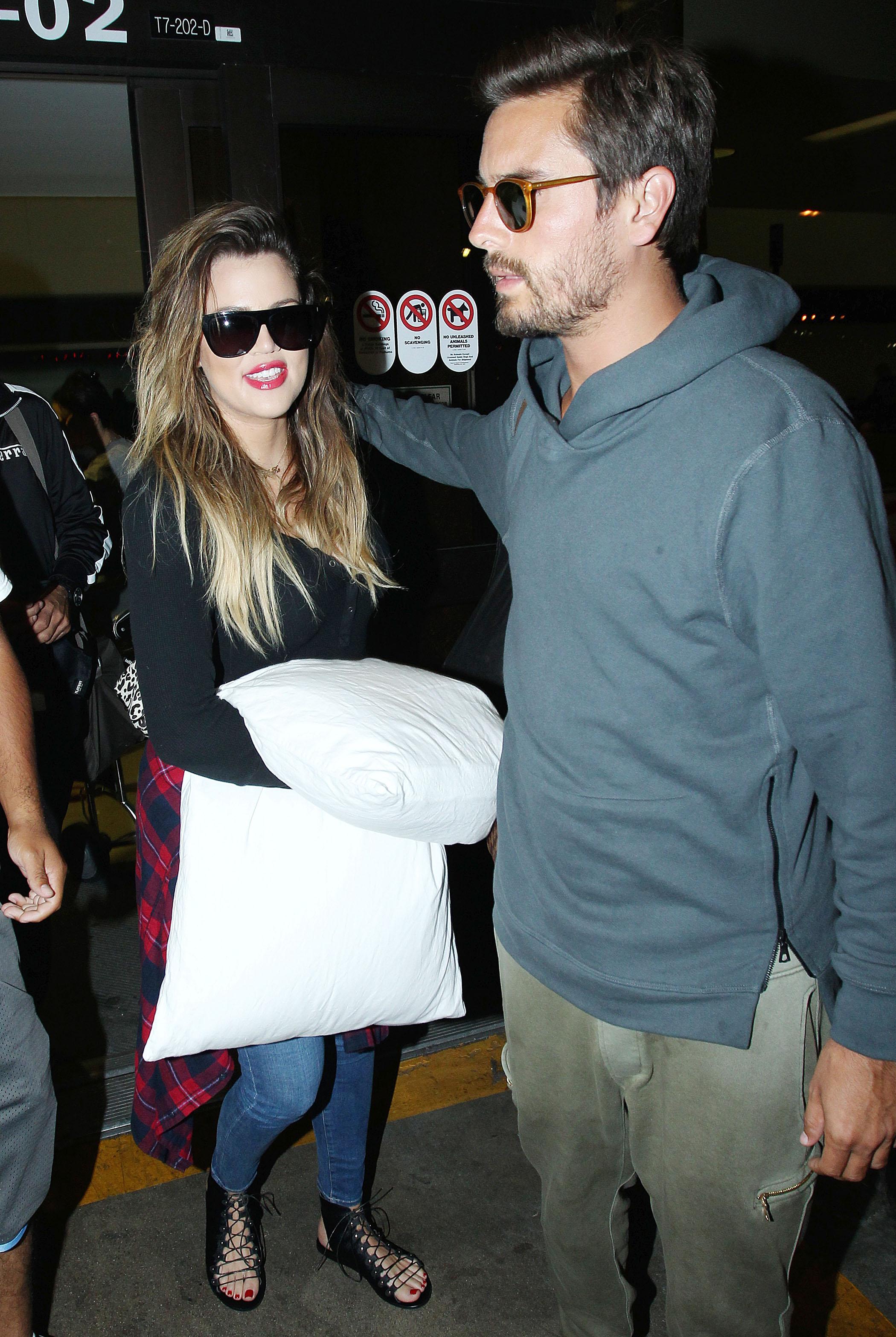 Khloe Kardashian and Scott Disick at Los Angeles International Airport