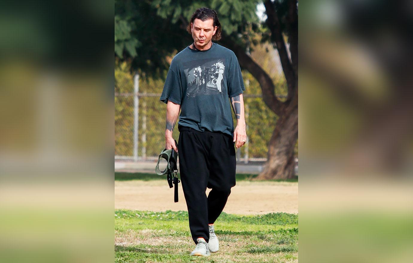 gavin rossdale walks his dog in the park blake shelton gushes holiday plans with gwen stefani