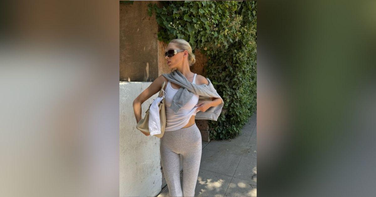 image of Elsa Hosk wore a sheer white tank and leggings in a bold athleisure look.