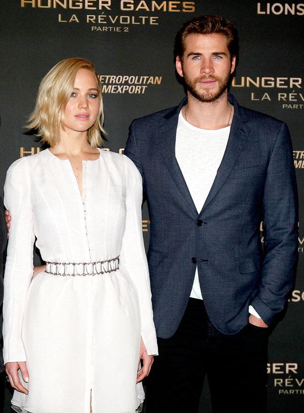 Jennifer lawrence liam hemsworths sparks flying hunger games mockingjay press tour