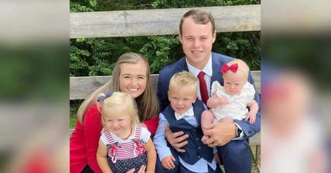 photo of kendra and joseph duggar with three of their children