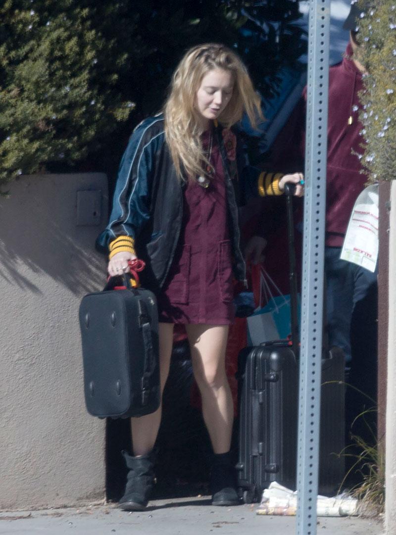 EXCLUSIVE: **PREMIUM EXCLUSIVE RATES APPLY** Billie Lourd leaves her Santa Monica home with rumored boyfriend Taylor Lautner, a day after the death of her mother, Carrie Fisher.