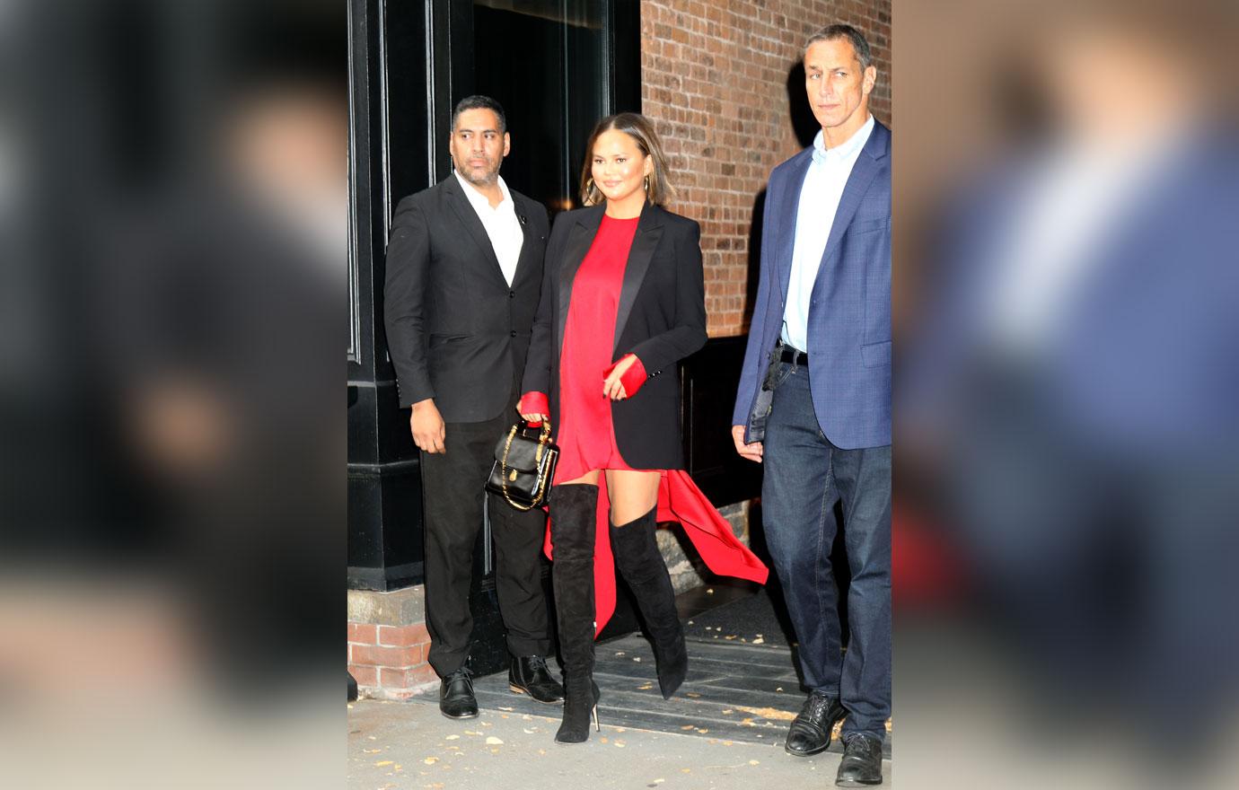 Chrissy Teigen in red Dress and Thigh High Boots