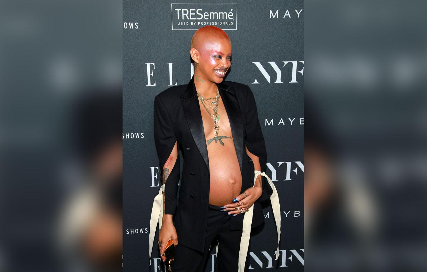 Slick Woods Showing Off Baby Bump