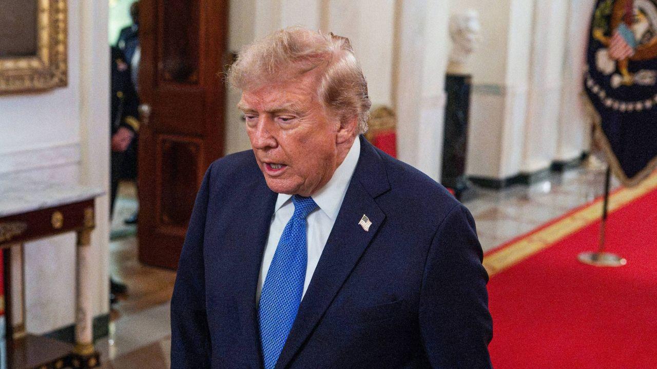 Image of Donald Trump’s hair later appeared darker before returning to a familiar style.
