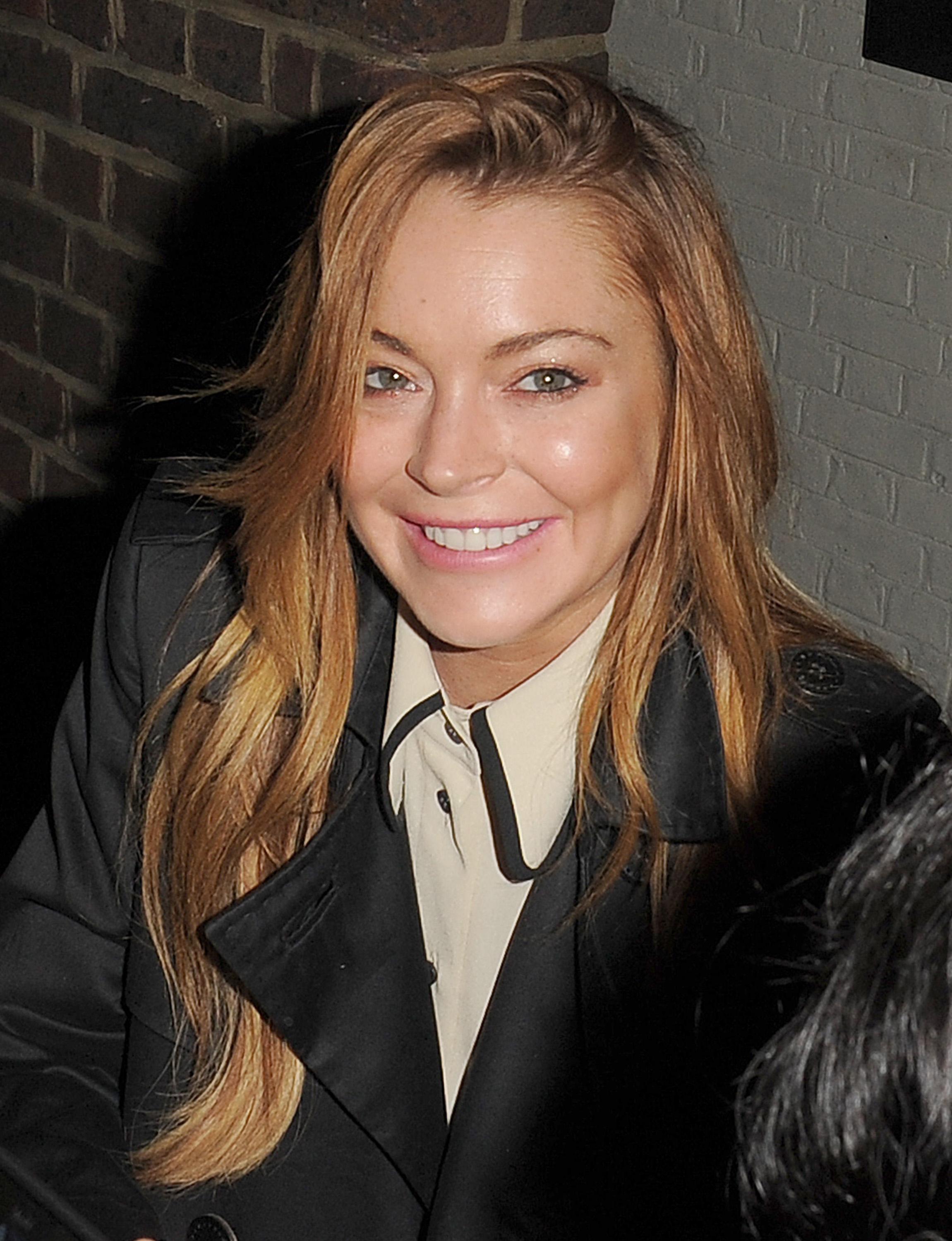 EXCLUSIVE: Lindsay Lohan seen out and about in London before going to the playhouse for her performance