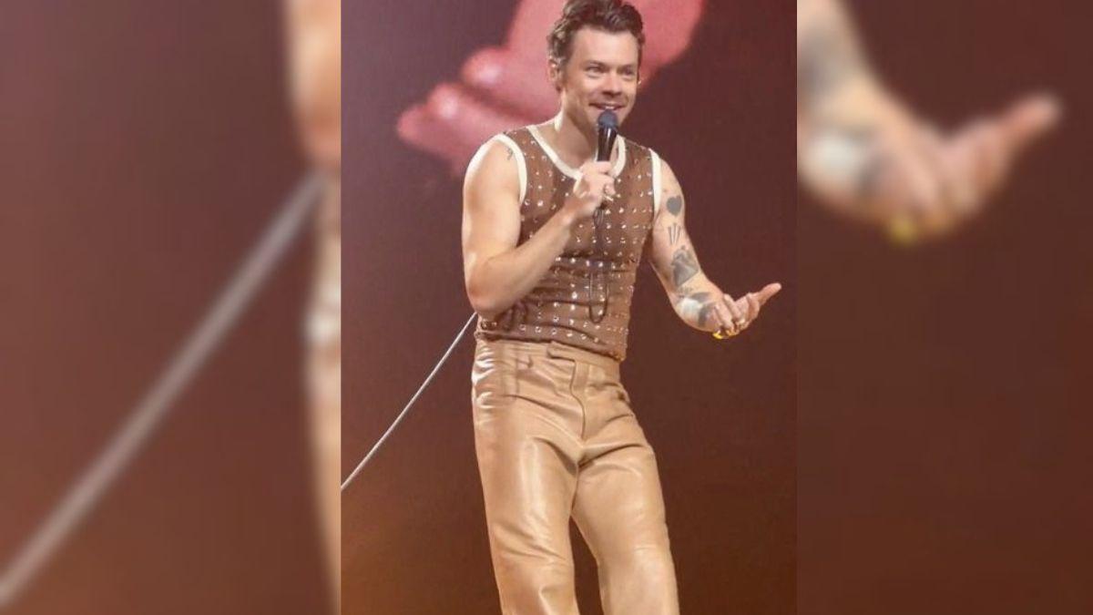 Image of Harry Styles collapsed onstage while performing 'As It Was' in London on Friday.