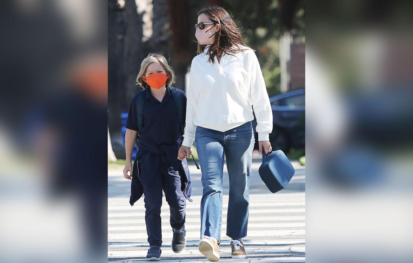 jennifer garner picks up son samuel from school while romance john miller gets serious