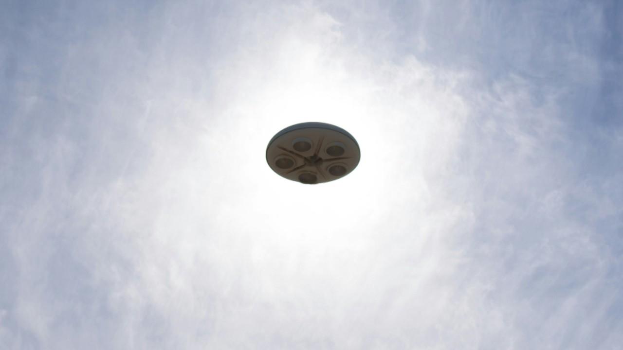Image of a mysterious saucer-shaped formation appeared above Canmore, Alberta, on August 2, sparking UFO speculation.