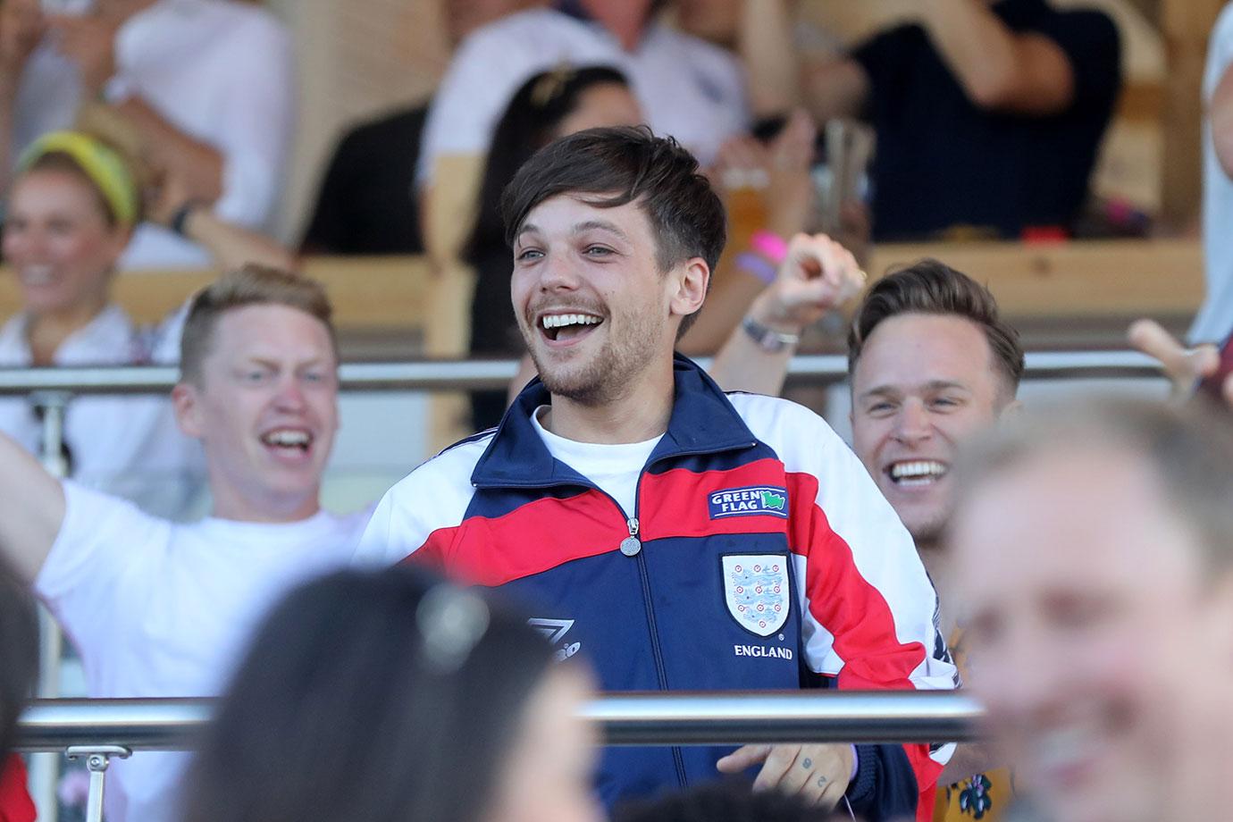 EXCLUSIVE: Louis Tomlinson and girlfriend watch England lose to Croatia