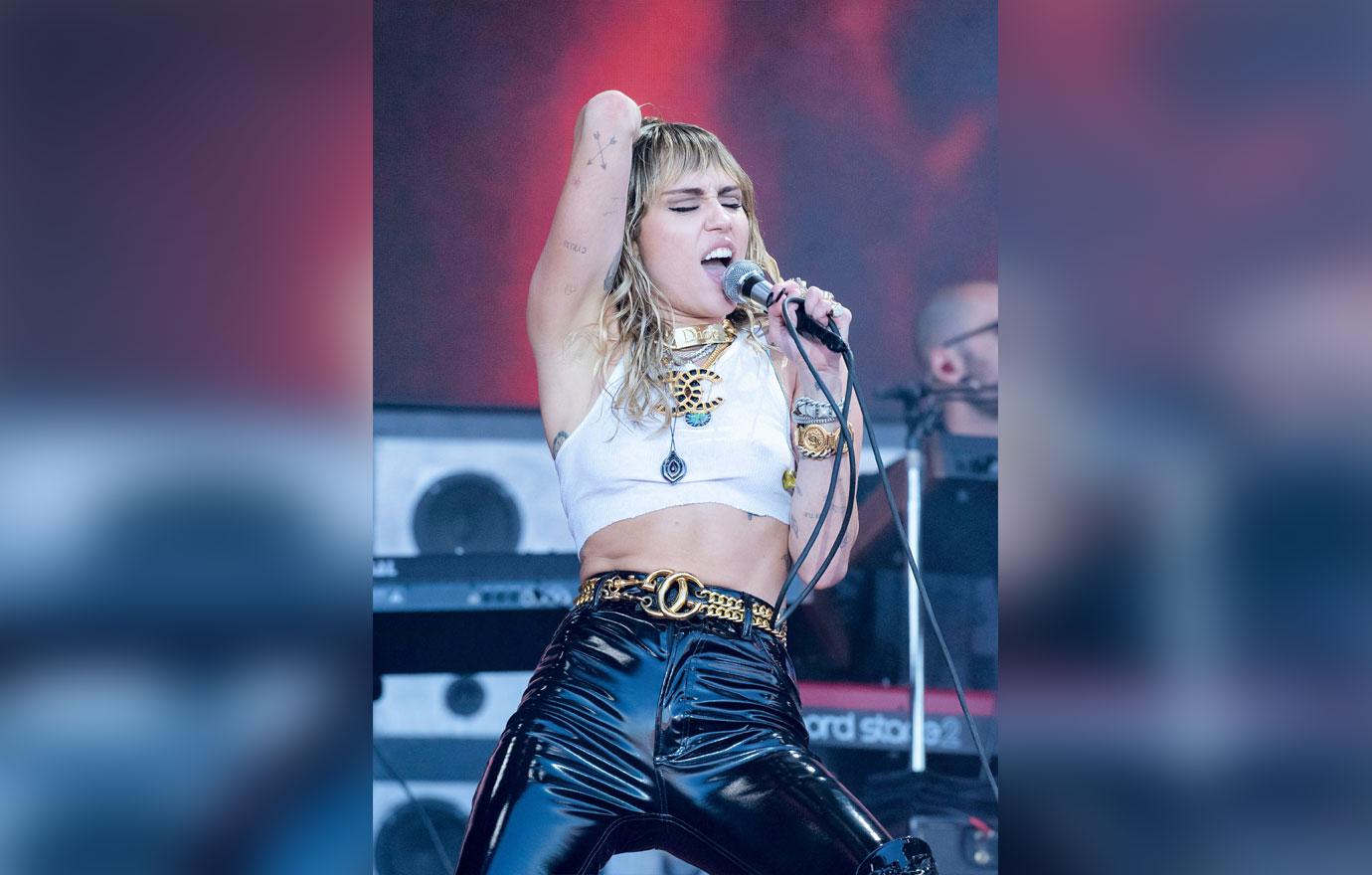 Miley Cyrus Performing On Stage miley cyrus tattoo divorce