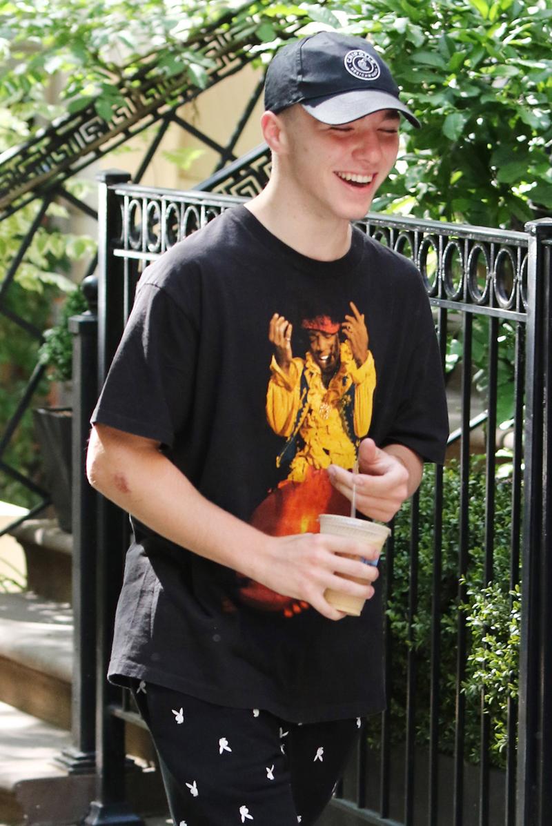 Rocco Ritchie rocks some Playboy pants while out with friends