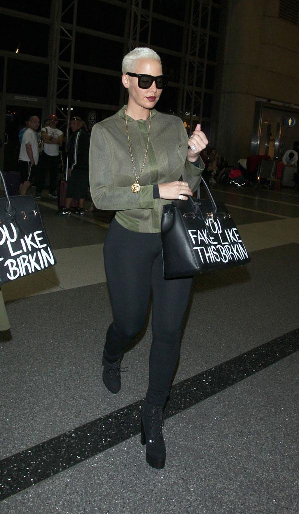 Amber Rose MOCKS Nemesis Kim Kardashian With Knock-Off Bag, Calls Her 'Fake  Like This Birkin