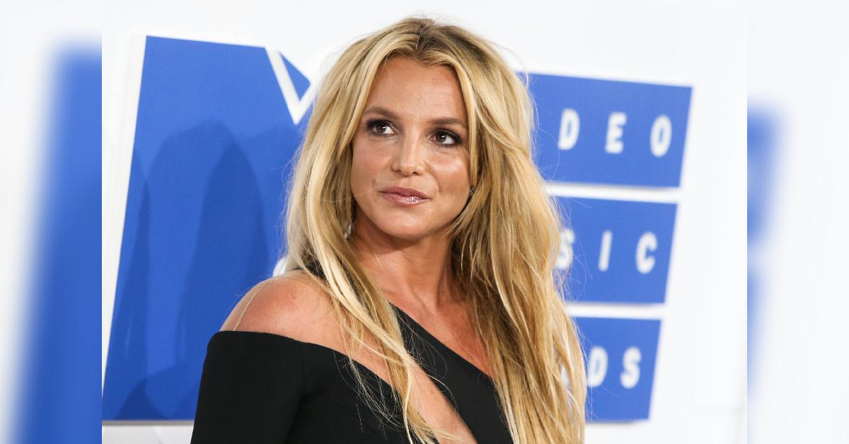 britney spears teases trip after vowing to sue