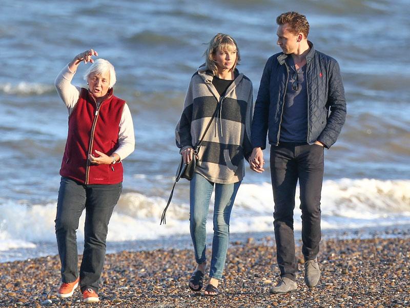 Taylor swift tom hiddleston hold hands cuddle beach date uk photos 02