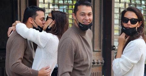 Katie Holmes and boyfriend Emilio Vitolo Jr. are all smiles as they continue another steamy make-out session outside his restaurant in NYC